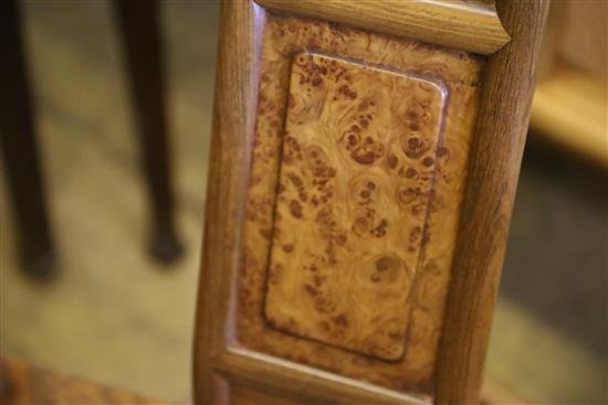 A pair of Chinese Ming style hardwood elbow chairs, with caned seats, W.54cm, D.48cm, H.95cm